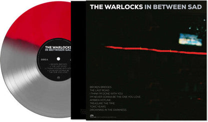 The Warlocks - In Between Sad - Silver/red (Vinyl) { vinyl }
